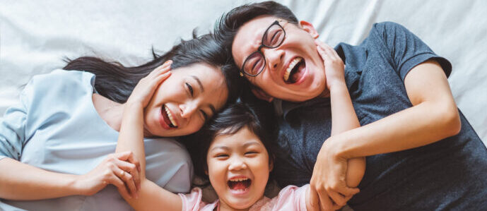 Happy Asian Family At Home